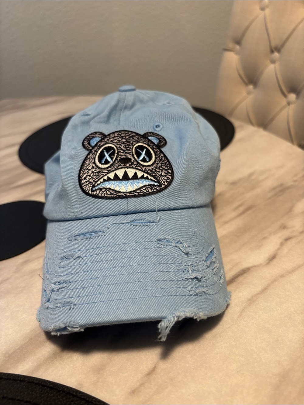 Light Blue Distressed Baseball Cap with Bear Patch. Adjustable. Unisex